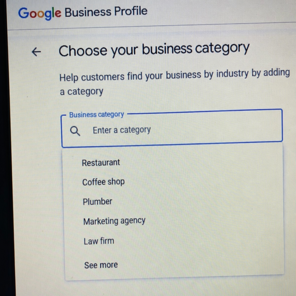 Close up of a computer screen showing the Google Business Profile category selection menu